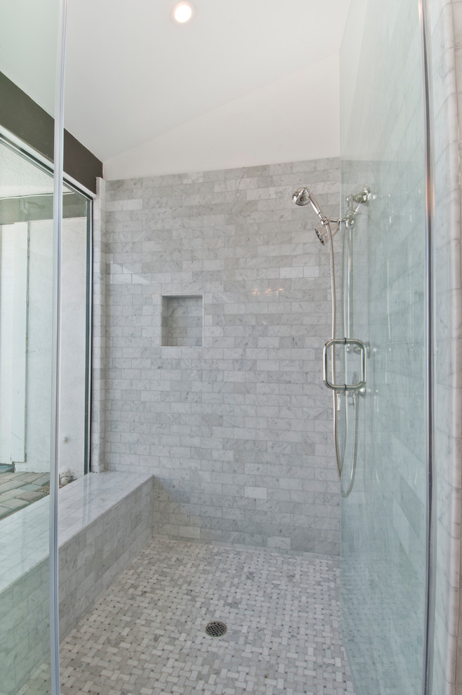 Inspiration for a large contemporary master bathroom in Los Angeles with shaker cabinets, white cabinets, a corner shower, white tile, marble, brown walls, mosaic tile floors, an undermount sink, onyx benchtops, grey floor, a hinged shower door and brown benchtops.