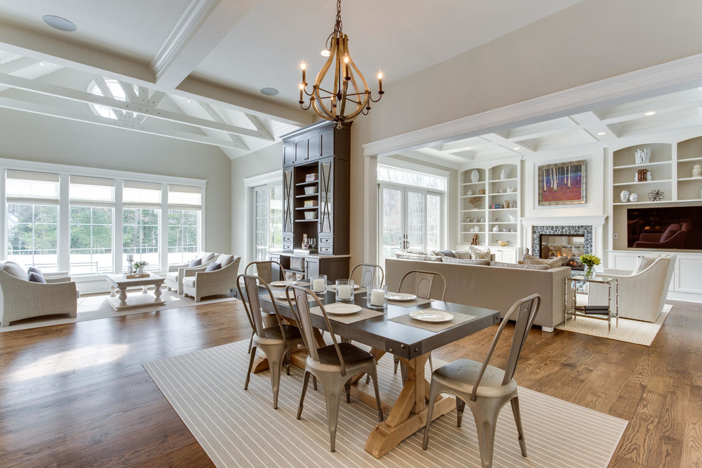 Inspiration for a transitional open plan dining in Atlanta with white walls and medium hardwood floors.