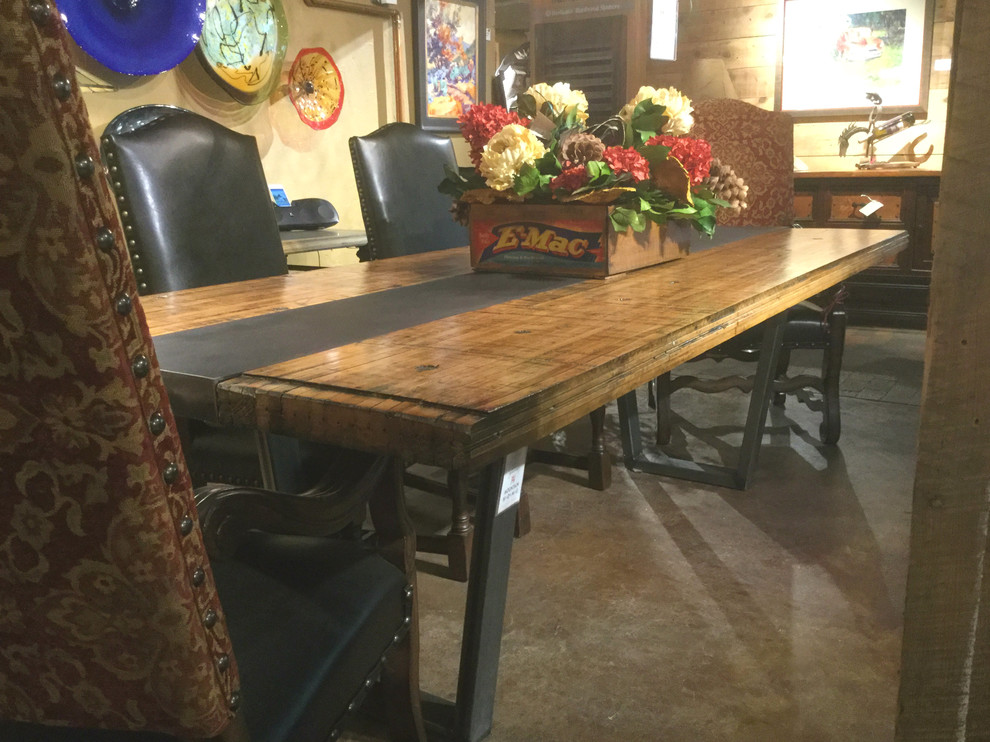 Example of a mountain style dining room design in Denver