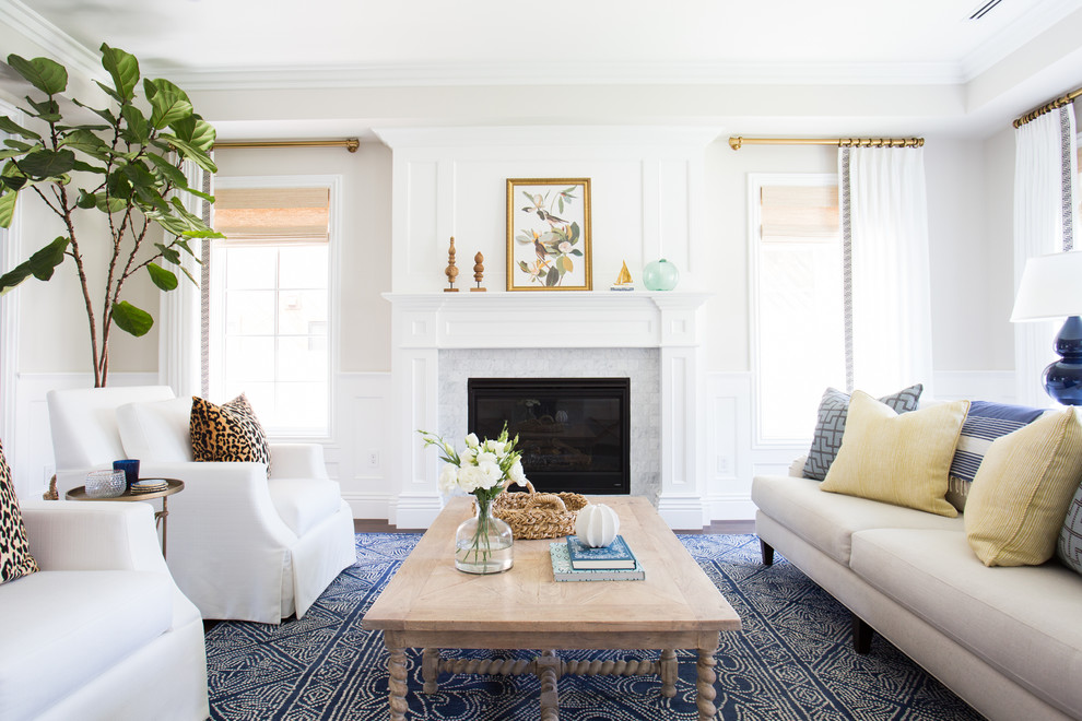 Design ideas for a transitional formal living room in Los Angeles with white walls, a standard fireplace, a tile fireplace surround and no tv.