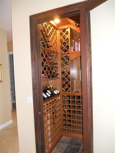 Photo of a mediterranean wine cellar in Other with slate floors.