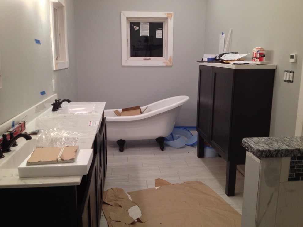 How to secure acrylic clawfoot tub to floor