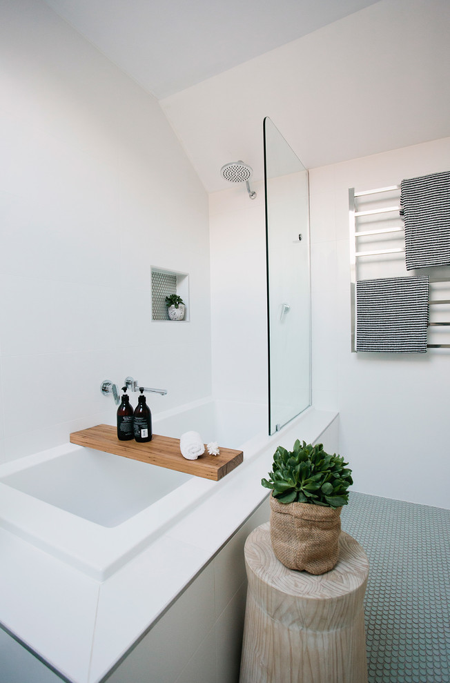 Design ideas for a mid-sized beach style master bathroom in Sydney with flat-panel cabinets, white cabinets, a corner tub, a corner shower, white walls and a drop-in sink.