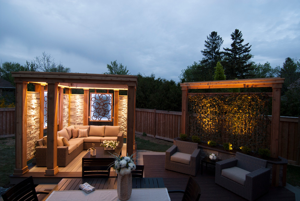 Mid-sized contemporary backyard deck in Toronto with an outdoor kitchen and no cover.