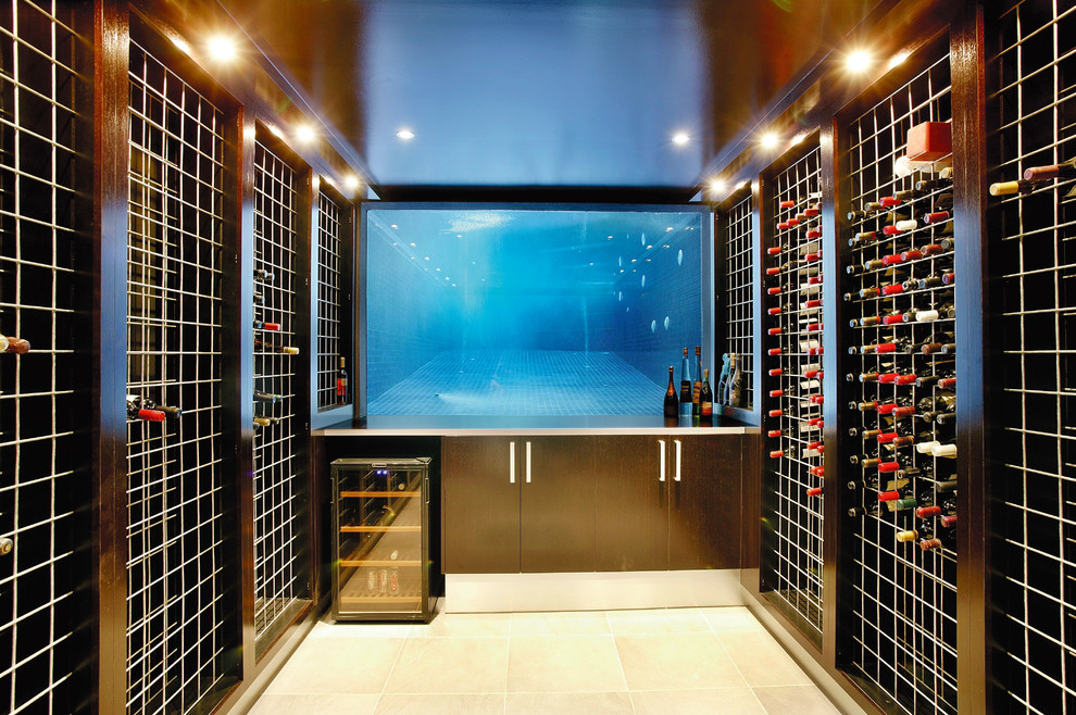 This is an example of a large contemporary wine cellar in Melbourne with storage racks.
