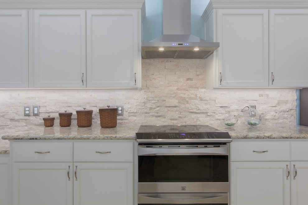 Inspiration for a large transitional galley eat-in kitchen remodel in Miami with flat-panel cabinets and white cabinets