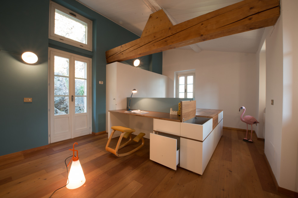 Photo of a contemporary home office in Milan.