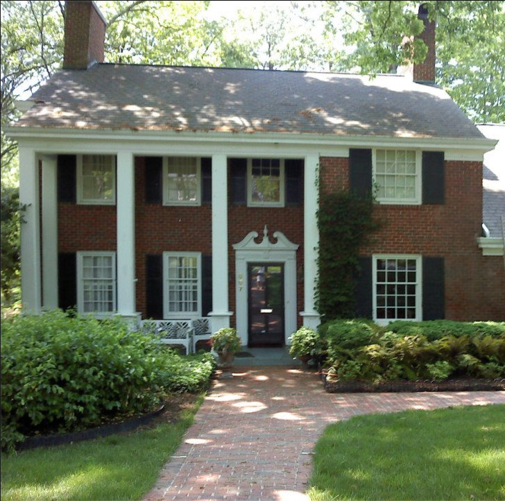 Mid-sized transitional red two-story brick exterior home idea in Charlotte
