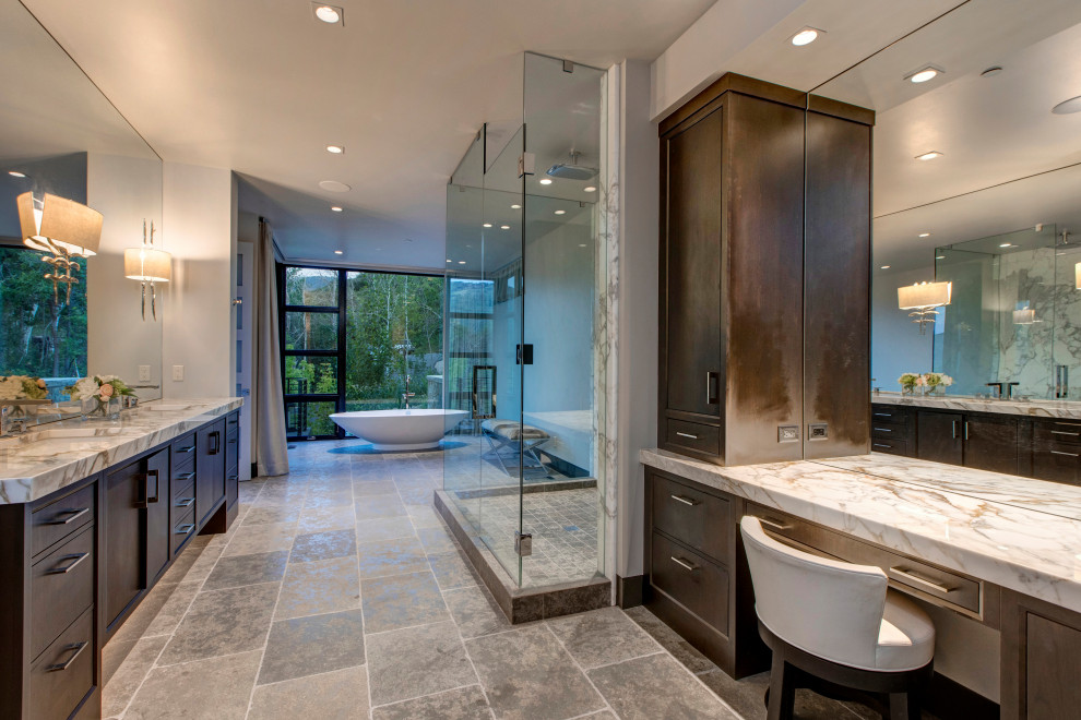 Expansive country bathroom in Salt Lake City with shaker cabinets, medium wood cabinets, porcelain floors, grey benchtops and a double vanity.