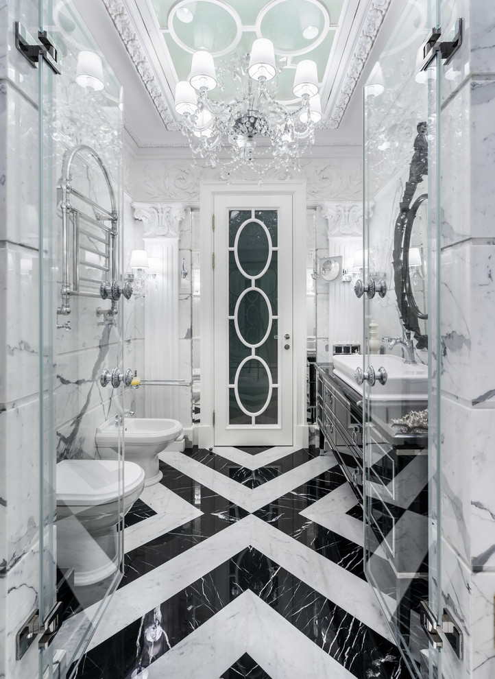Traditional 3/4 bathroom in Saint Petersburg with black cabinets, an alcove shower, a bidet, white tile, gray tile, marble, marble floors, a vessel sink, multi-coloured floor, a hinged shower door, white walls and flat-panel cabinets.
