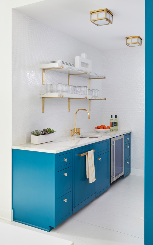 Small transitional galley marble floor and white floor kitchen pantry photo in Chicago with a single-bowl sink, marble countertops, white backsplash and stainless steel appliances