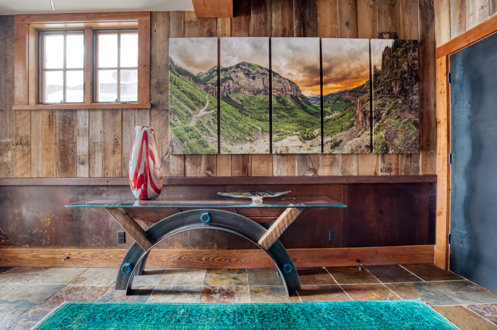 Inspiration for a rustic entryway remodel in Denver