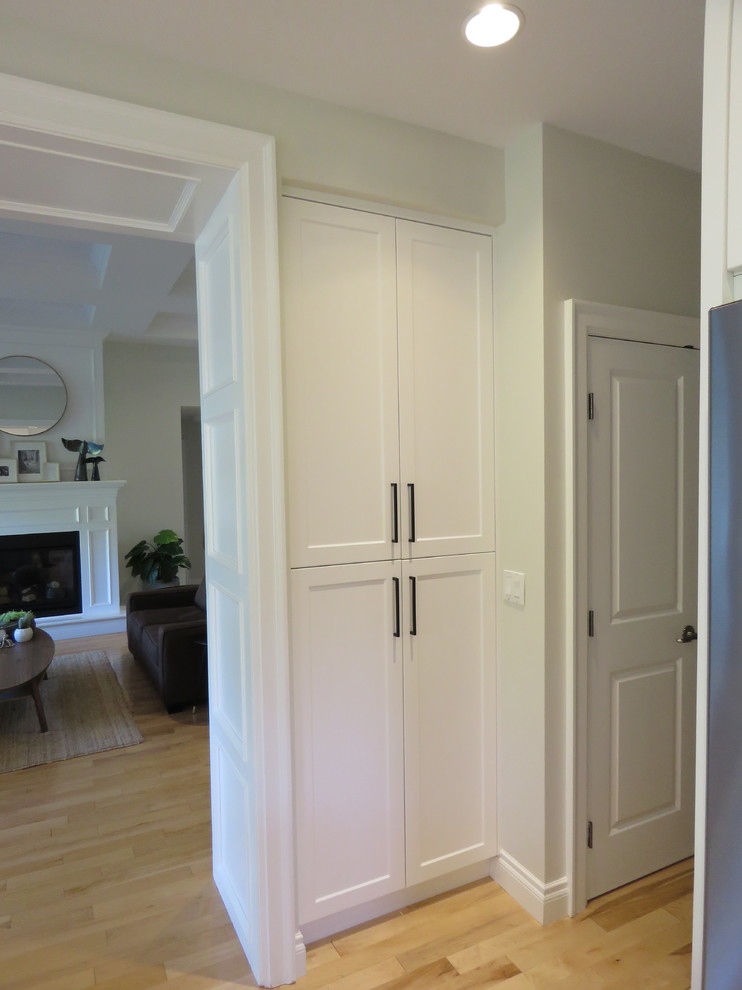 Example of a transitional kitchen design in Vancouver