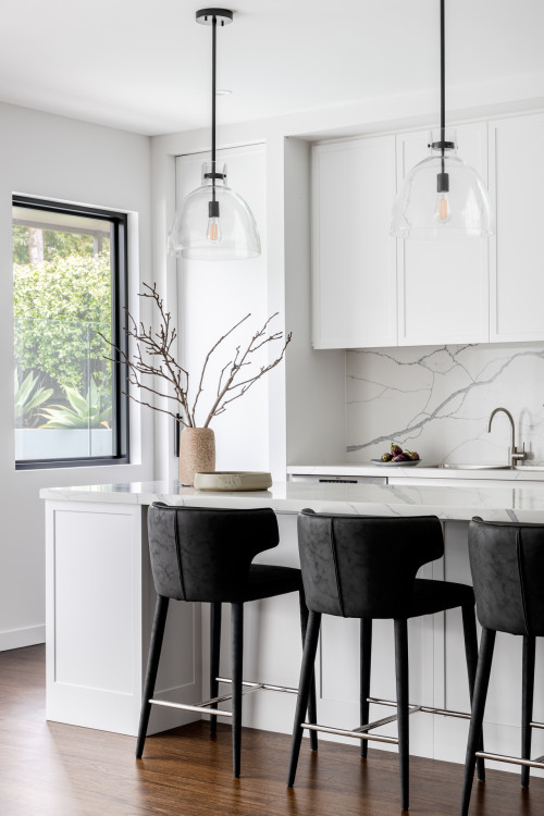 Classic Meets Modern: White Kitchen Island Inspirations with Marble Slab Backsplash and Black Stools