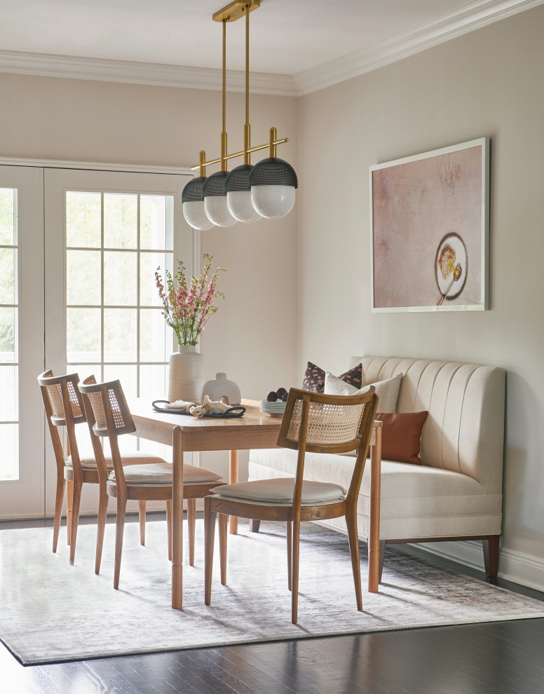 Inspiration for a mid-sized transitional medium tone wood floor and black floor kitchen/dining room combo remodel in New York