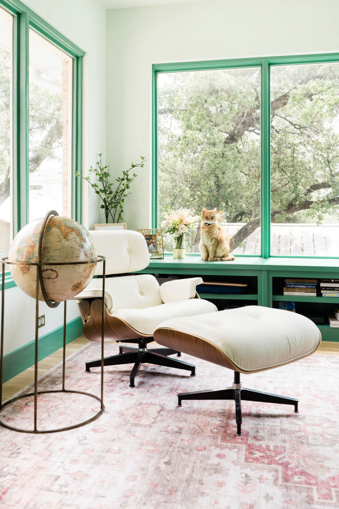 Example of a transitional home design design in Austin