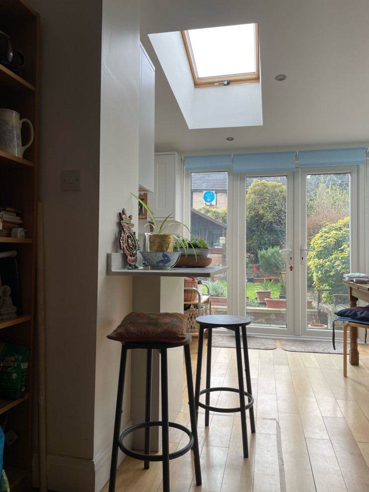 A light filled, contemporary kitchen and living space reconfiguration