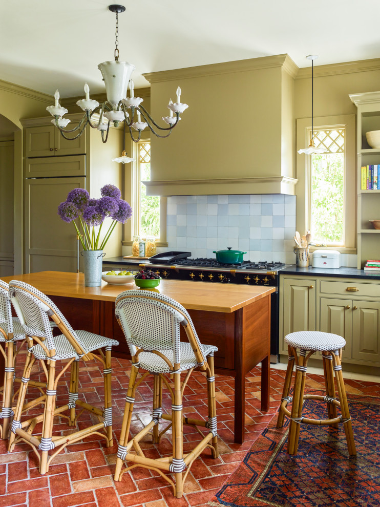 Larchmont Victorian - A khaki-colored Victorian kitchen with plain Dutch Delft tile backsplash and terra cotta brick floors. Vintage adorable chandelier!