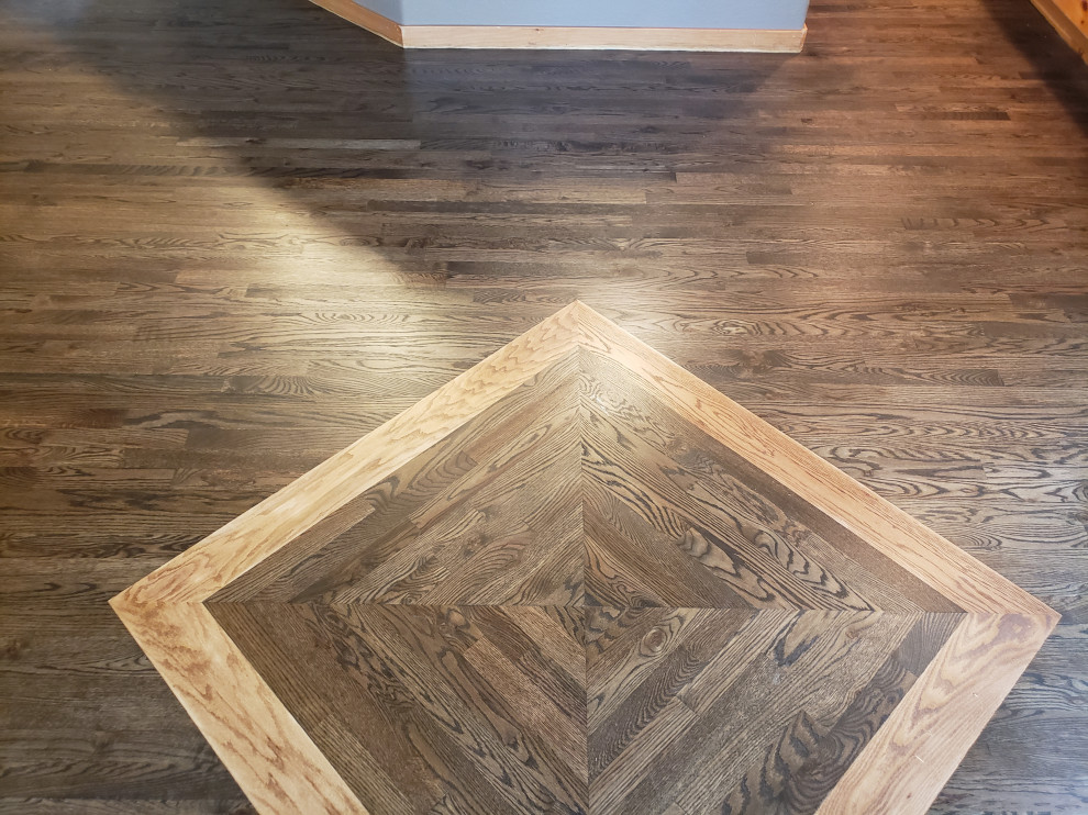 Hardwood Elegance with Custom Inlays & Entry Border