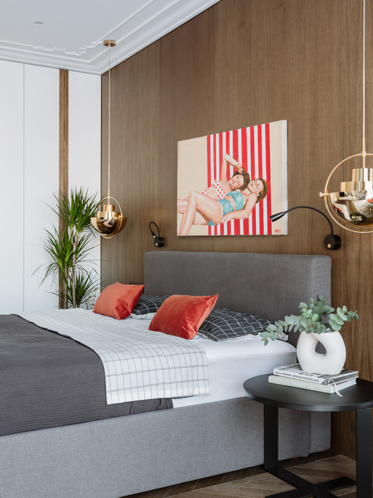Design ideas for a contemporary bedroom in Saint Petersburg with brown walls, medium hardwood floors, brown floor and wood walls.