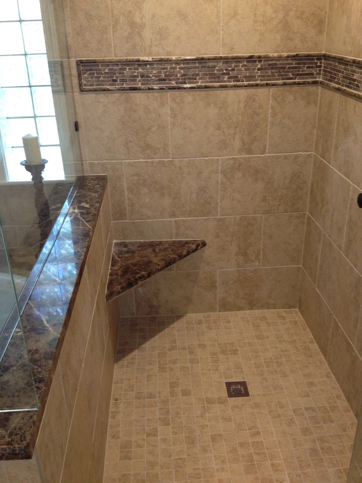 Photo of a transitional bathroom in Dallas with an alcove shower, beige tile and beige walls.