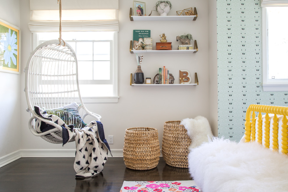Inspiration for a mid-sized eclectic kids' room in Los Angeles with dark hardwood floors.