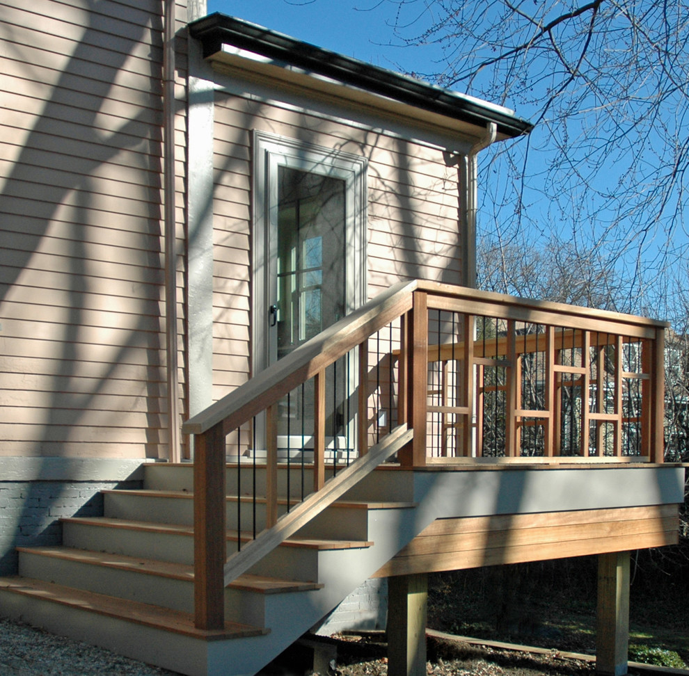 Deck - mid-sized transitional side yard deck idea in Boston with no cover