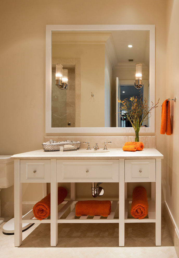 Mid-sized traditional bathroom in Miami with an undermount sink, white cabinets, beige tile, an alcove shower, beige walls, porcelain floors, granite benchtops, beige floor, a hinged shower door, white benchtops, a shower seat, a single vanity and recessed-panel cabinets.