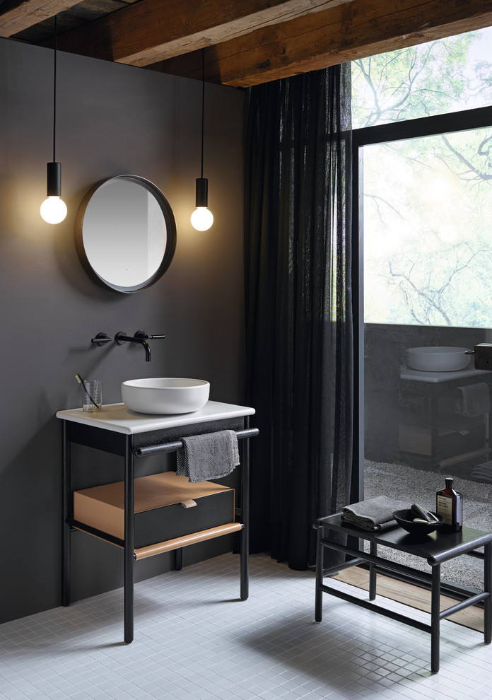 Small modern bathroom in Nuremberg with open cabinets, dark wood cabinets and a vessel sink.