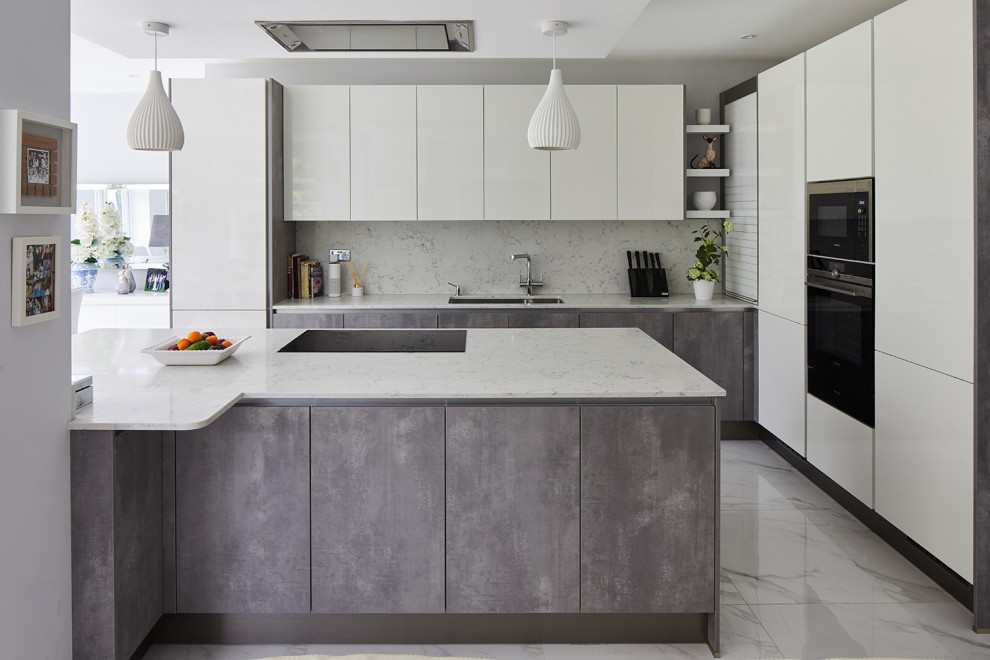 Design ideas for a mid-sized contemporary l-shaped eat-in kitchen in London with an undermount sink, flat-panel cabinets, grey cabinets, marble benchtops, white splashback, marble splashback, panelled appliances, porcelain floors, with island, white floor and white benchtop.