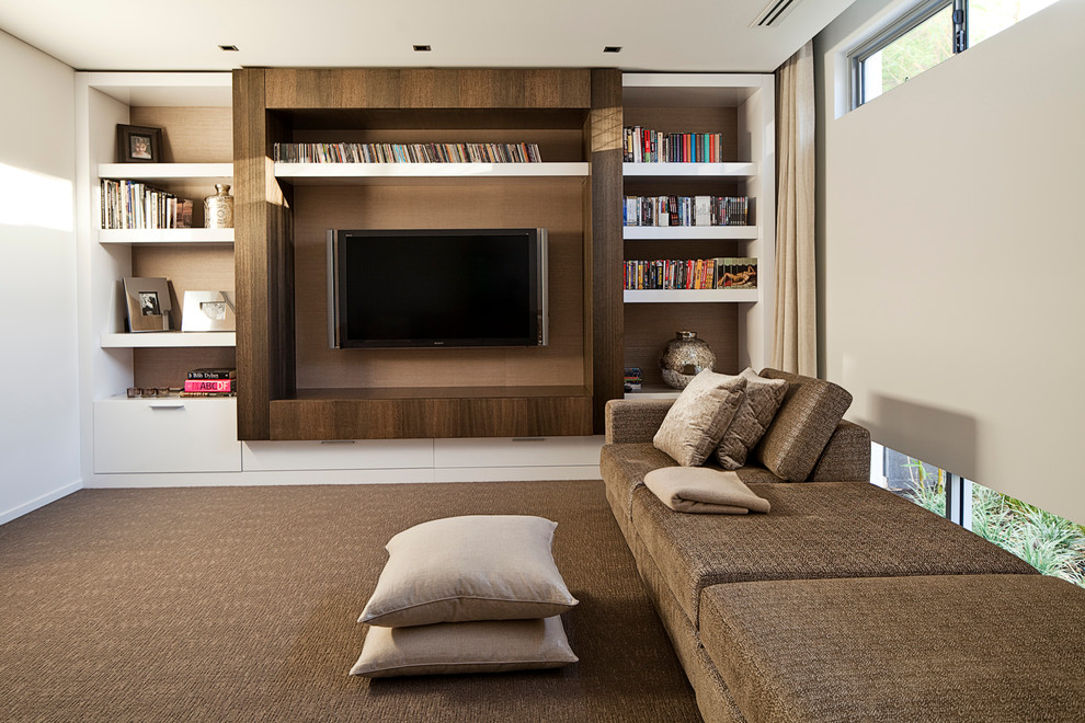 Inspiration for a beach style open concept living room in Perth with white walls, carpet, no fireplace and a built-in media wall.