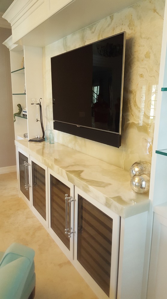 Example of a transitional home design design in Miami
