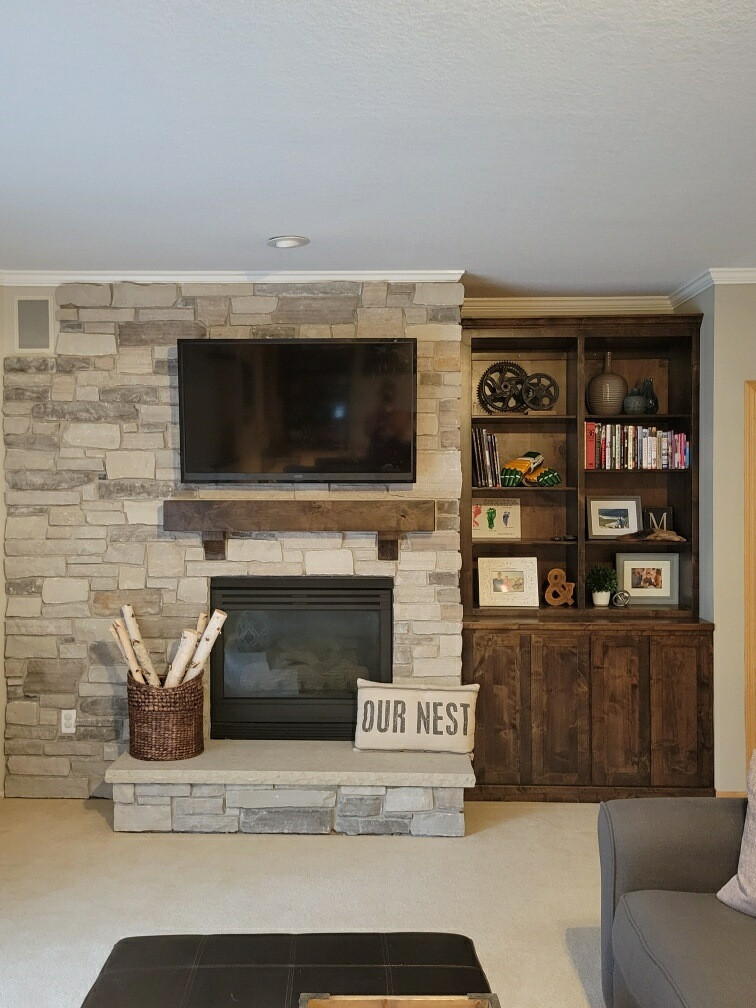 Custom built in shelving and mantle