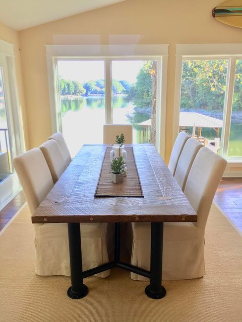 Mid-sized transitional medium tone wood floor and brown floor great room photo in Charlotte with yellow walls