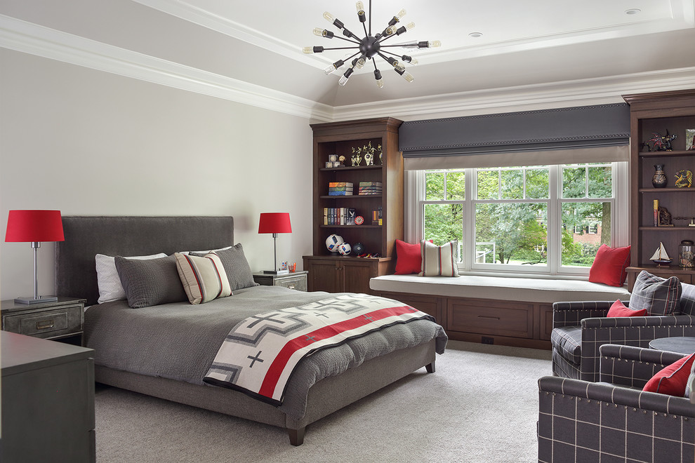 Boy's Bedroom in Gray with Red Accents - Teenage boy's bedroom with gray and red color palette. Red accents on pillows, in bedspread and on lampshades. Built in cabinetry surrounds window and window seat.

Peter Rymwid Photography
