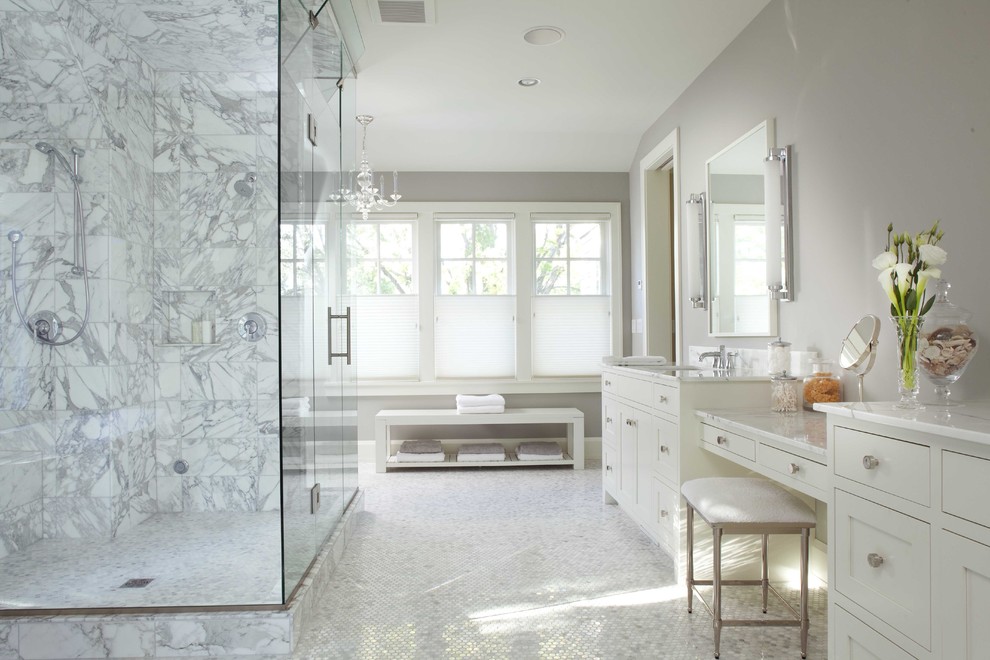 This is an example of a large traditional bathroom in Minneapolis with mosaic tile, an undermount sink, recessed-panel cabinets, white cabinets, marble benchtops, a corner shower, white tile, grey walls, mosaic tile floors and white benchtops.