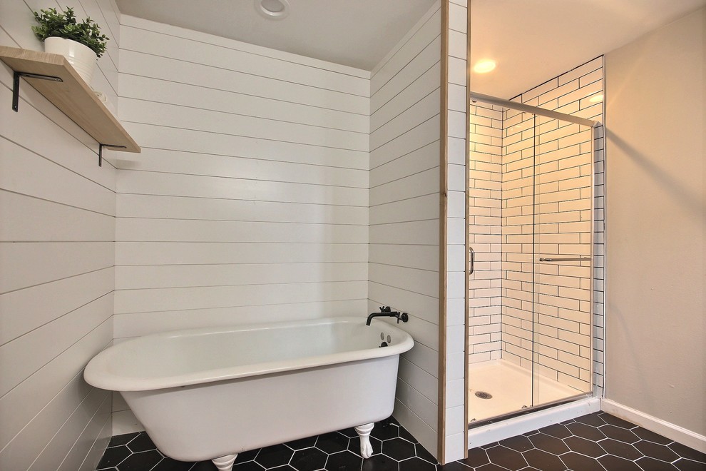 Design ideas for a large country master bathroom in Seattle with shaker cabinets, white cabinets, a claw-foot tub, a corner shower, black tile, ceramic tile, green walls, ceramic floors, an undermount sink, engineered quartz benchtops, black floor, a sliding shower screen and white benchtops.