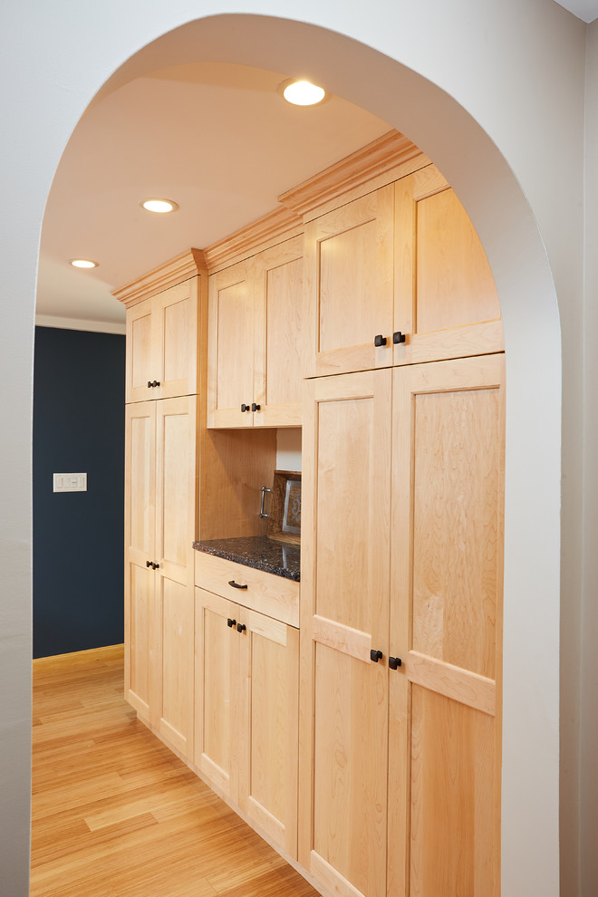 Example of a transitional home design design in Boston