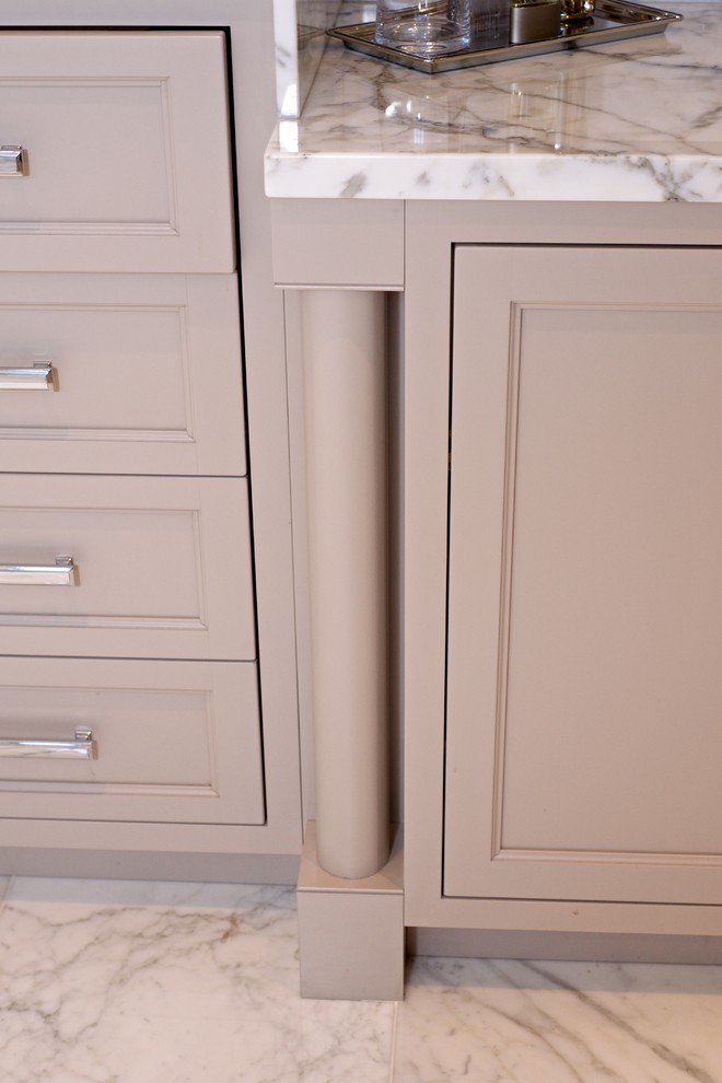 Bathroom - transitional master bathroom idea in St Louis with beaded inset cabinets, brown cabinets and an undermount sink