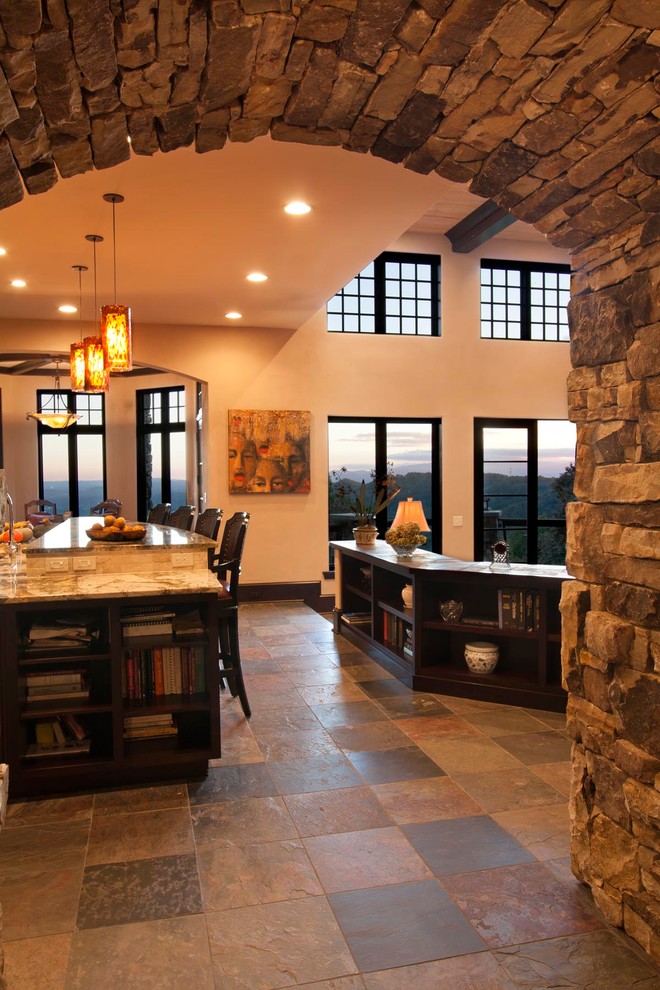 Huge transitional slate floor open concept kitchen photo with beige walls and no fireplace