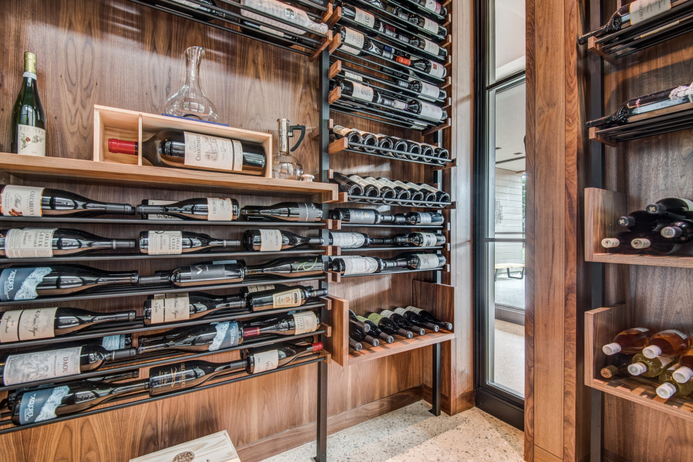 Inspiration for a midcentury wine cellar in Dallas.
