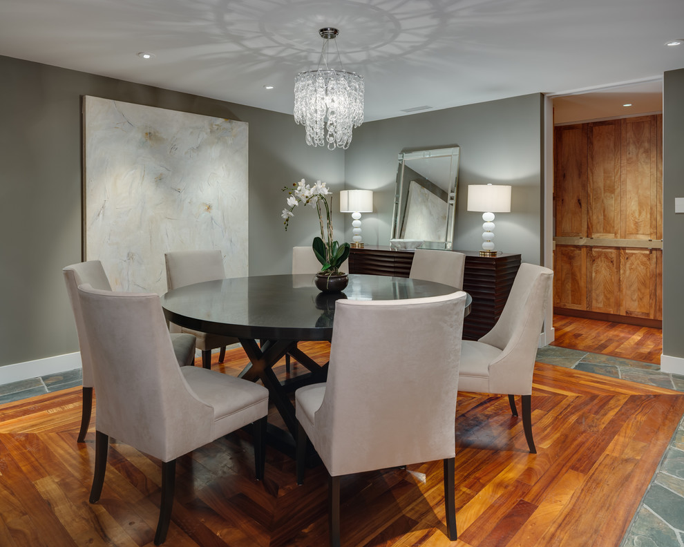Transitional dining room in Orange County with grey walls and medium hardwood floors.
