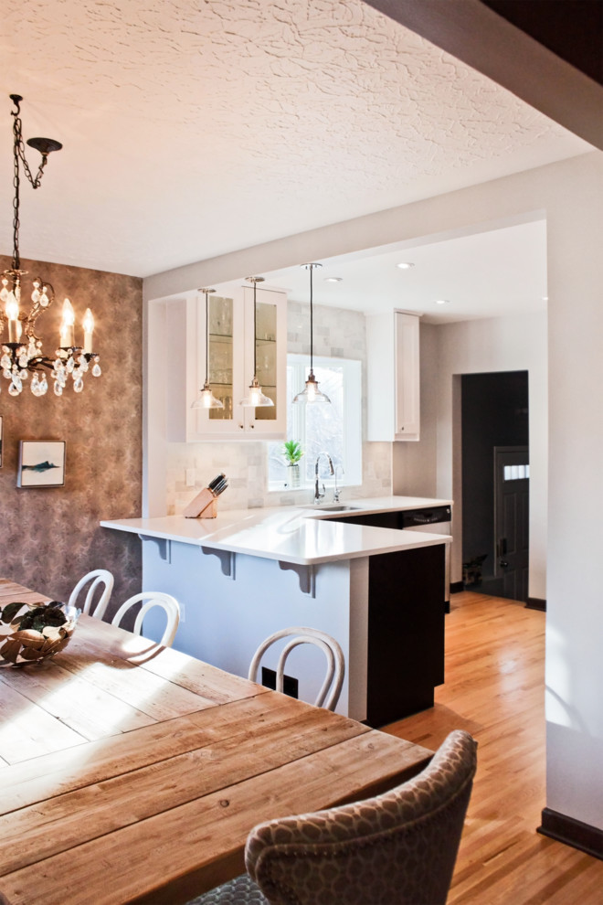 Transitional home design photo in Calgary