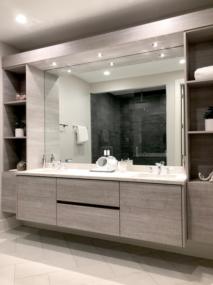 Mid-sized contemporary master bathroom in Chicago with furniture-like cabinets, medium wood cabinets, an open shower, a one-piece toilet, porcelain tile, white walls, ceramic floors, an undermount sink, engineered quartz benchtops, a hinged shower door, white benchtops, white tile and grey floor.