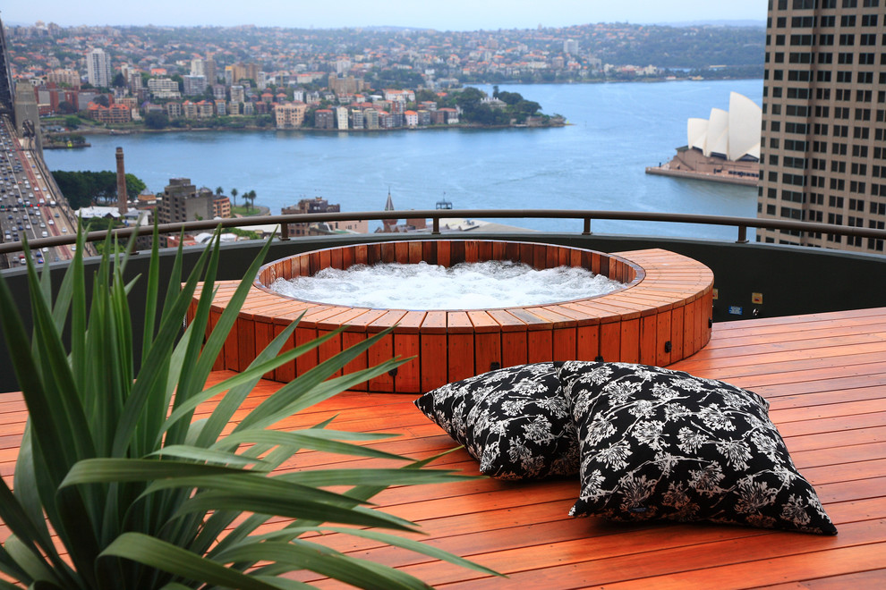 Contemporary pool in Sydney with a hot tub.
