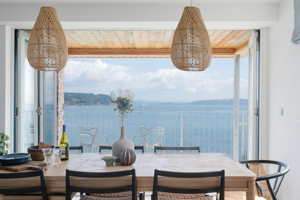 Inspiration for a beach style dining room in Cornwall.