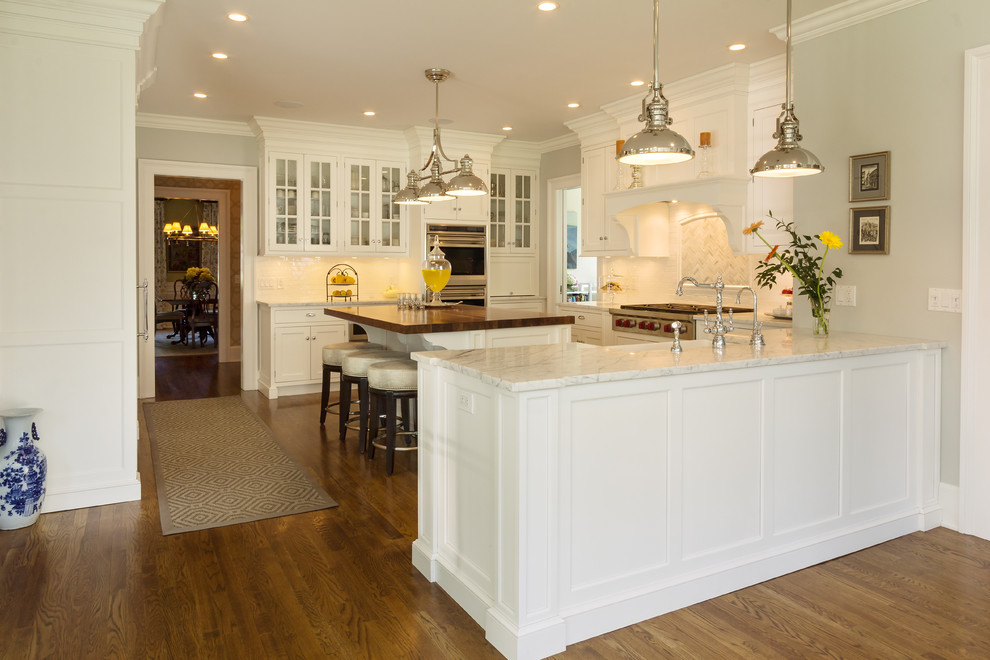 Transitional kitchen photo in New York with two islands