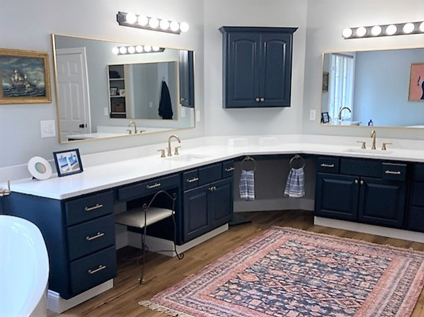 Large transitional master white tile and ceramic tile medium tone wood floor and brown floor alcove shower photo in Boston with gray walls, a hinged shower door and a niche