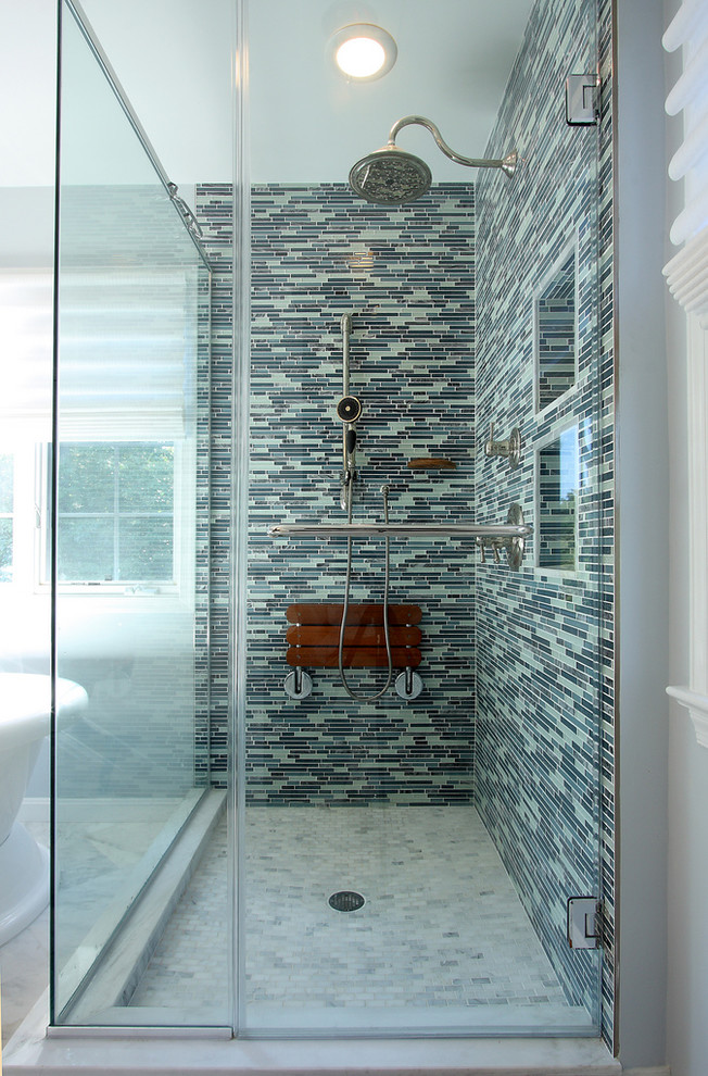 Inspiration for a mid-sized contemporary master bathroom in DC Metro with an alcove shower, blue tile, matchstick tile, shaker cabinets, dark wood cabinets, a freestanding tub, blue walls, marble floors, an undermount sink, marble benchtops, a niche and a shower seat.