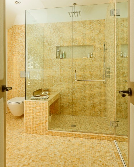 This is an example of a large modern master bathroom in Chicago with a wall-mount toilet and mosaic tile floors.